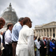 Rep. John Lewis (D-GA) (L) joins members of the US House of Representatives and members of the US Senate in a prayer circle in front of the US Capitol to honor those gunned down inside the historic Emanuel African Methodist Episcopal Church in Charleston South Carolina, June 18, 2015
Mark Wilson/Getty Images